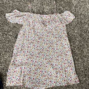 white sun dress with flower detail